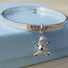 A Baby's First Christmas: Crafting Memories in Sterling Silver