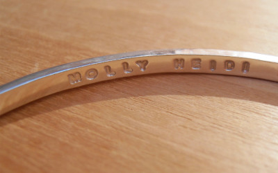 A Little Bit of Love: The Story Behind Our Hand-Stamped Silver Bangle