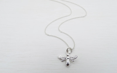 The Buzz Behind the Beauty: Our Sterling Silver Bee Necklace