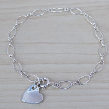 A Little Heart's Big Story: Crafting Our Sterling Silver Bracelet
