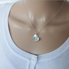 Crafting Your Story: The Silver Heart Necklace & Its Charm