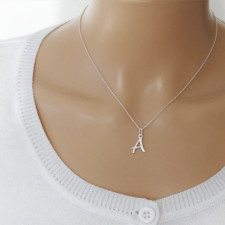 Your Initial, Your Story: The Craft of Our Silver Necklace