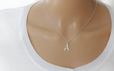 Your Initial, Your Story: The Craft of Our Silver Necklace