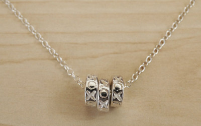 Hugs, Kisses & Sterling Silver: The Story of Our XOXO Necklace
