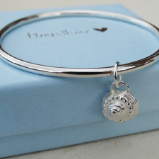 Coastal Charm: Your Solid Silver Winkle Bangle Story