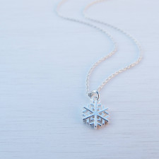 Tiny Silver Snowflake Necklace: The Art of Handcrafted Winter Magic