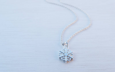 Tiny Silver Snowflake Necklace: The Art of Handcrafted Winter Magic