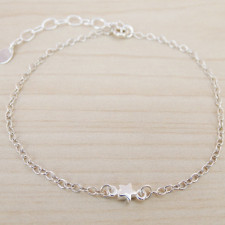 Twinkle, Twinkle: The Story Behind Our Tiny Silver Star Bracelet