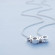 Tiny Hugs & Kisses: The Story Behind Our XOXO Necklace Charm
