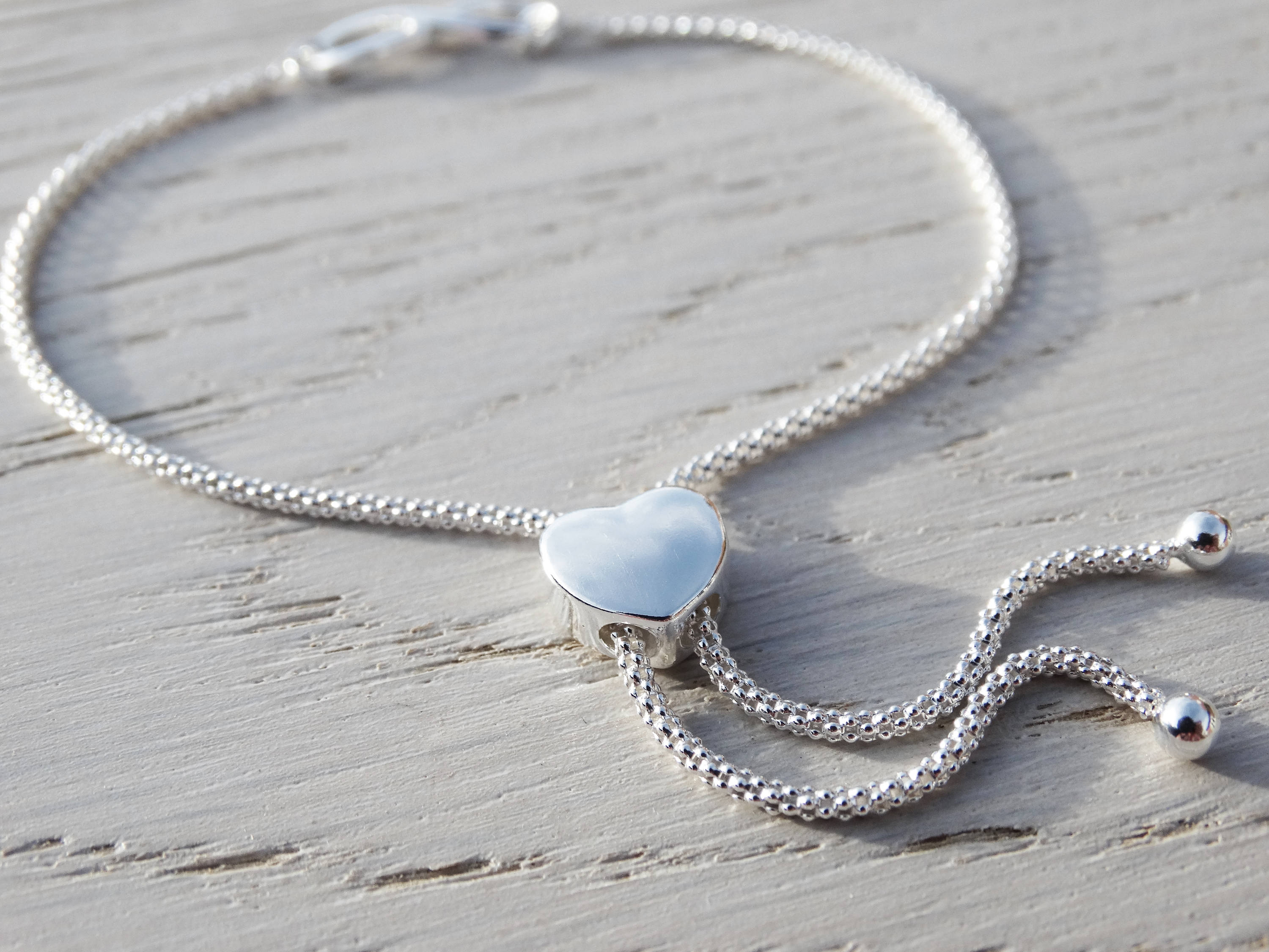 Infinity Bracelet With Heart Slider Clasp, Sterling Silver